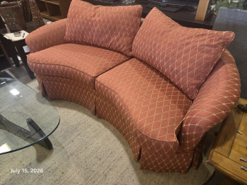 Vintage curved, kidney-shaped (or crescent-shaped) skirted sofa